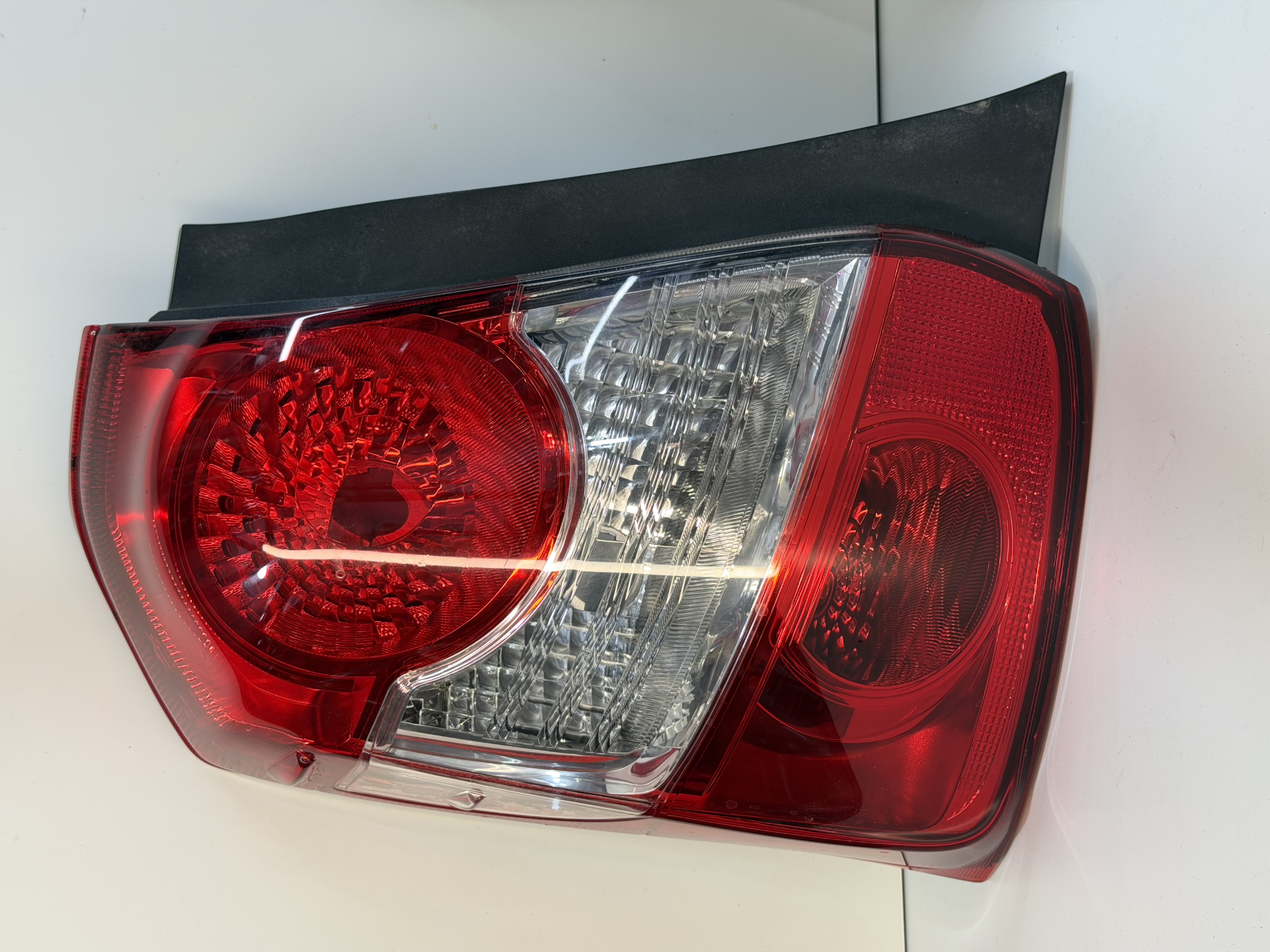 LANTERNA ETIOS HATCH 2013 A 2022 CRISTAL ARTEB ORIGINAL lado esquerdo - foto 1 de 4