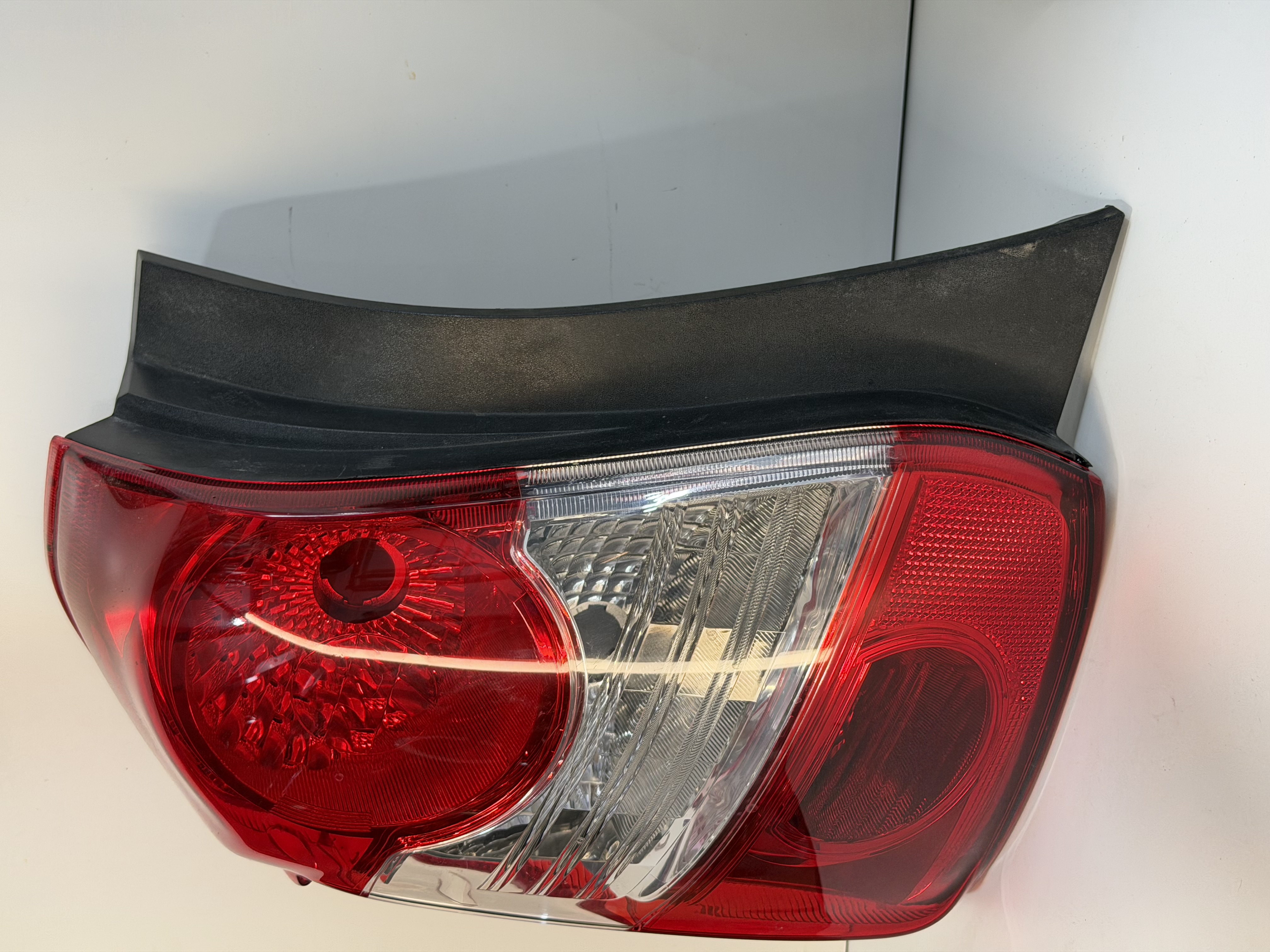 LANTERNA ETIOS HATCH 2013 A 2022 CRISTAL ARTEB ORIGINAL lado esquerdo - foto 2 de 4